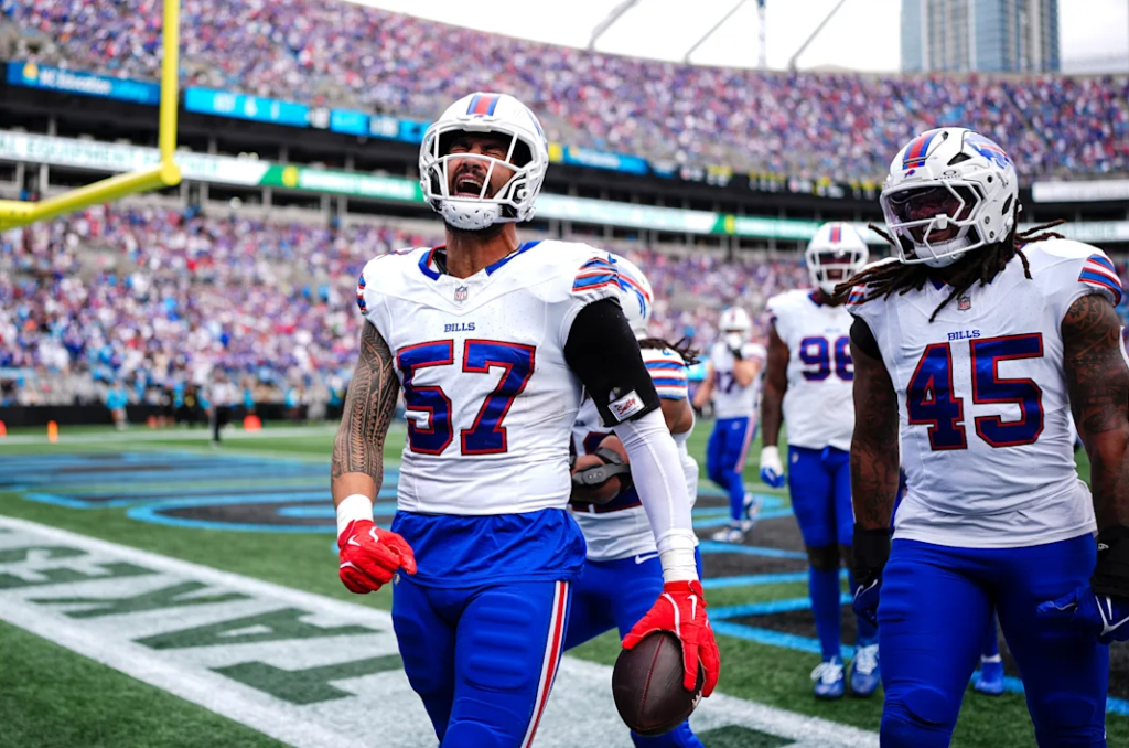 AJ Epenesa celebrates his interception.